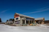 timber-frame clubhouse exterior